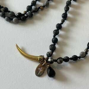Gold and Black Beaded Necklace with Charms